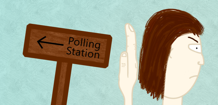 A wooden sign saying "polling station" points to the left, a disgruntled looking head faces to the right, the person's hand is held up to the sign.